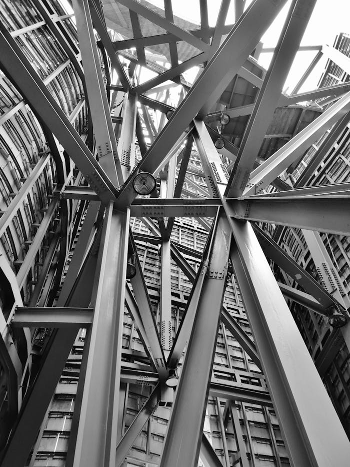 heros-img A detailed view of a complex steel framework showcasing modern industrial architecture.